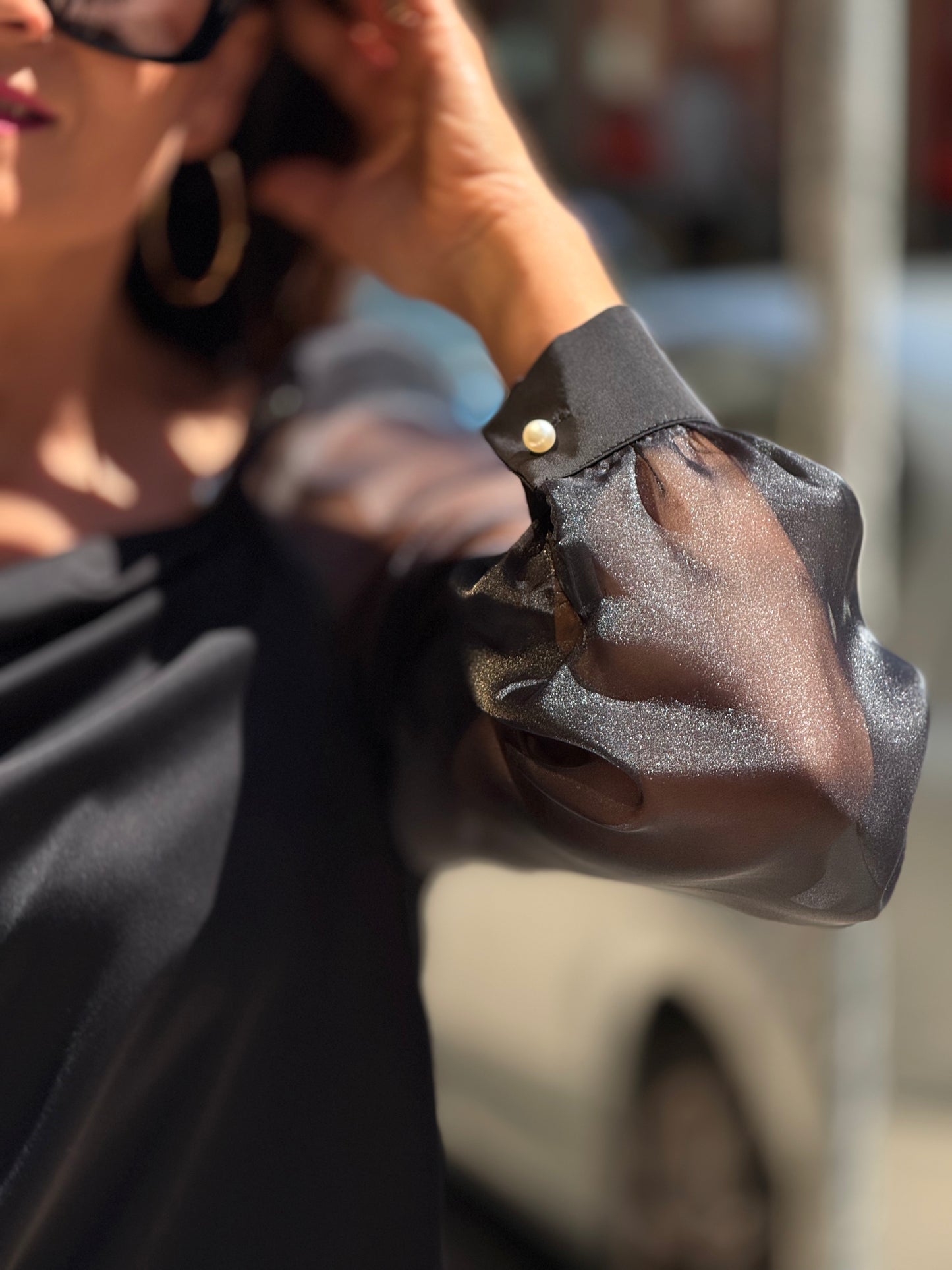 Blusa pérola e transparência