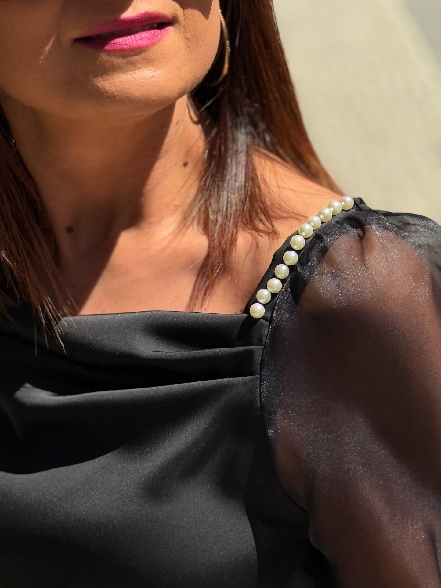 Blusa pérola e transparência