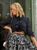 BLUSA PRETA COM FOLHOS