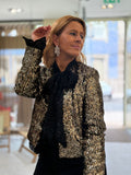 JAQUETA CHANEL DE LANTEJOULAS