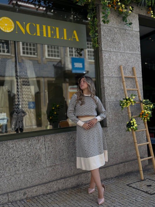 Conjunto de manha com padrões em preto e branco