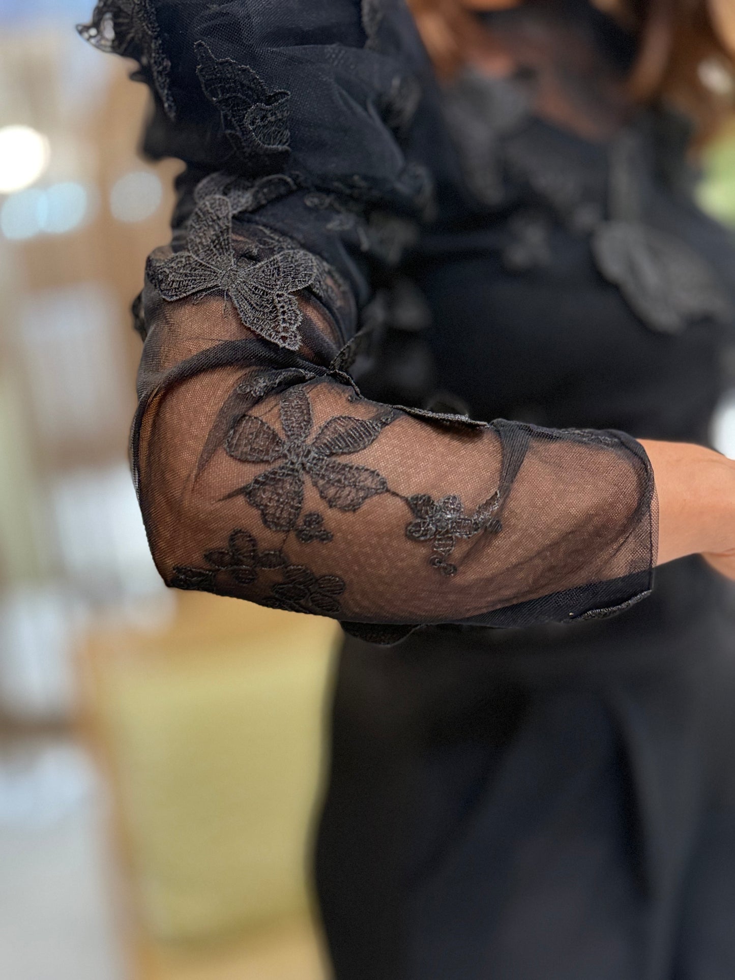 Blusa de transparente preta com proteção