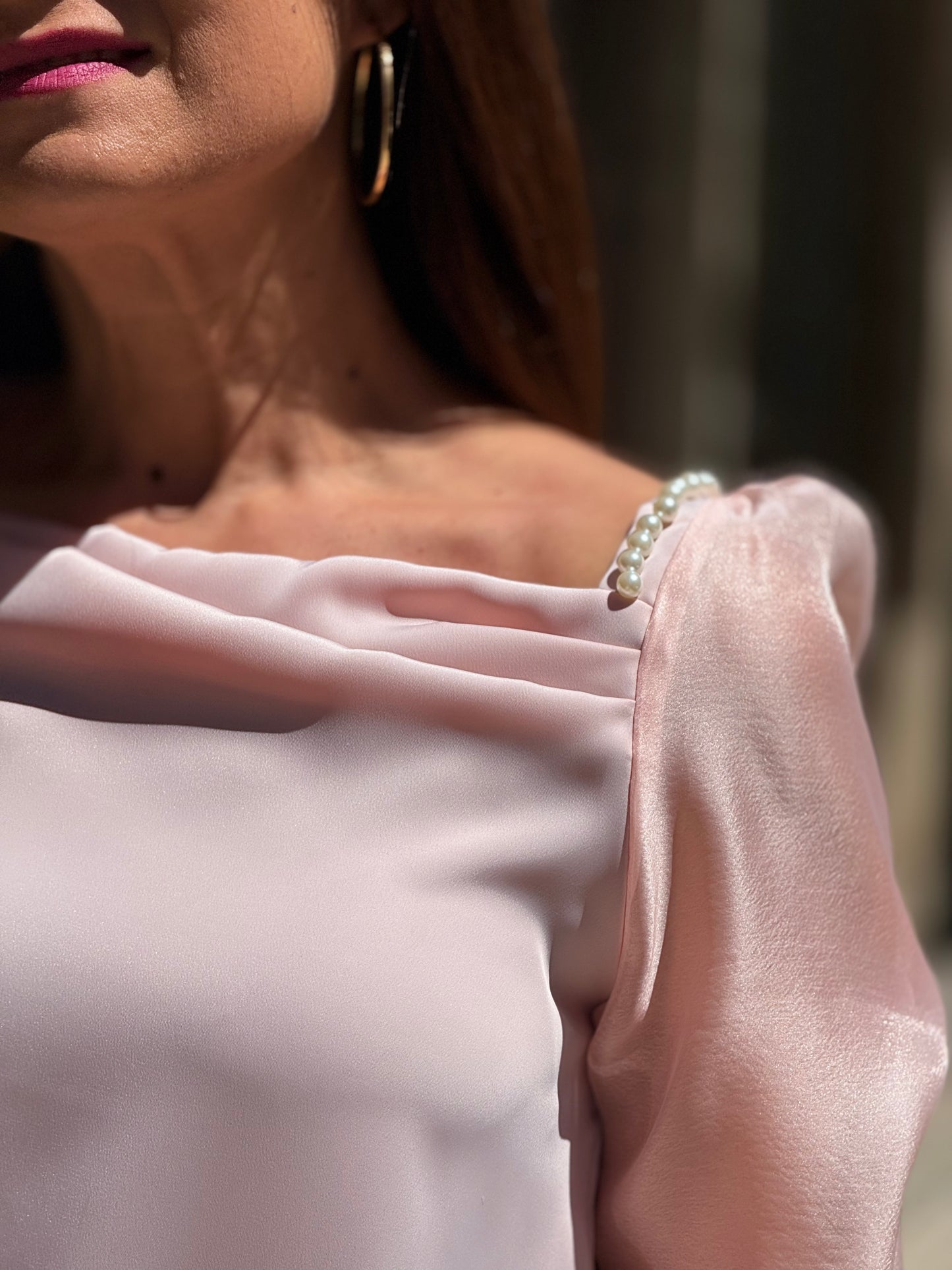 Blusa pérola e transparência