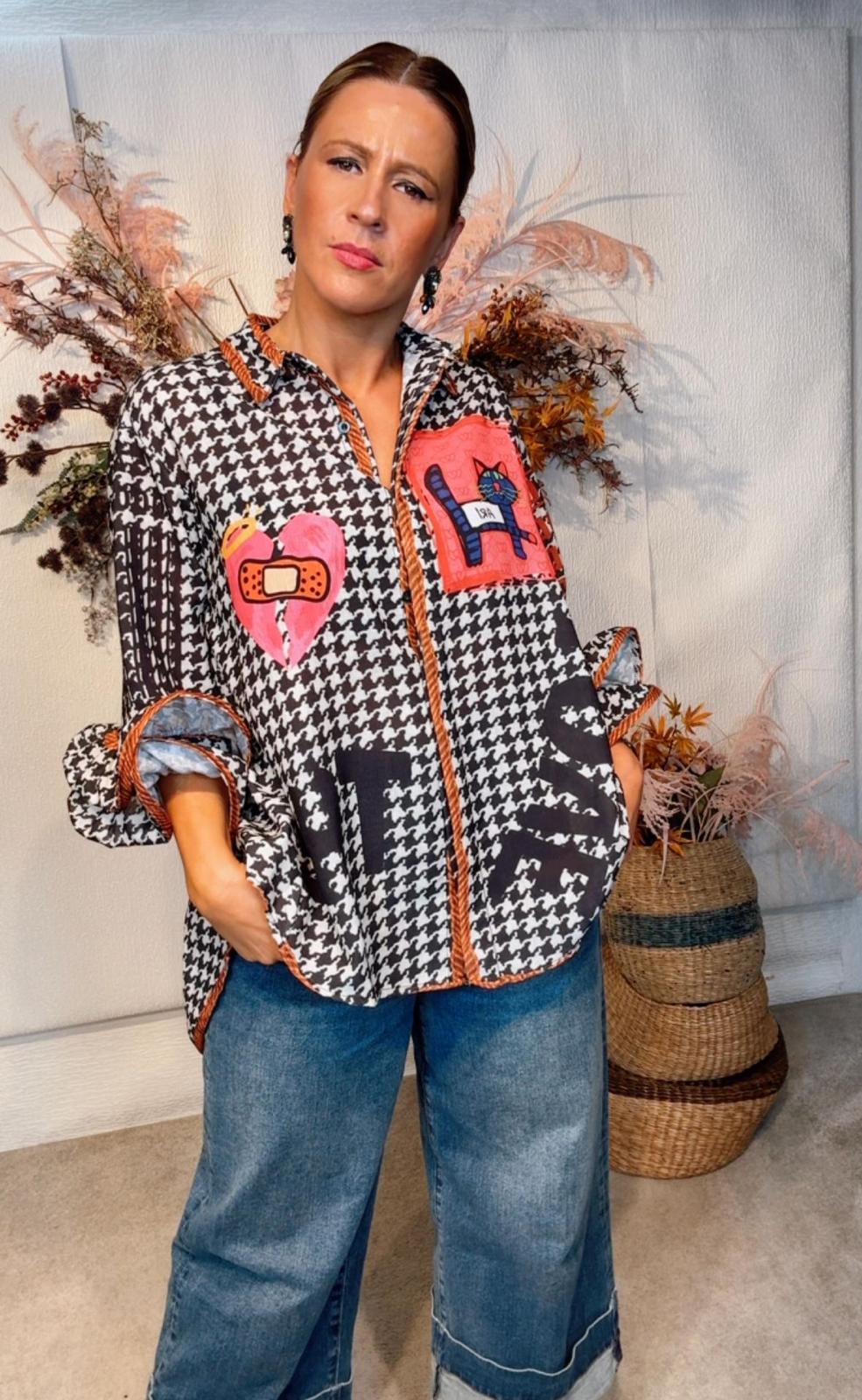 Blusa de pied de polle com gráficos